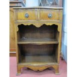 A Pair of Serpentine Fronted Mahogany Book Cabinets, each with twin drawers on bracket feet, 51cm