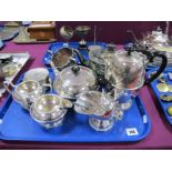 A Plated Four Piece Tea Set, with similar sugar scuttle, a plated teapot, set of coasters, etc:- One