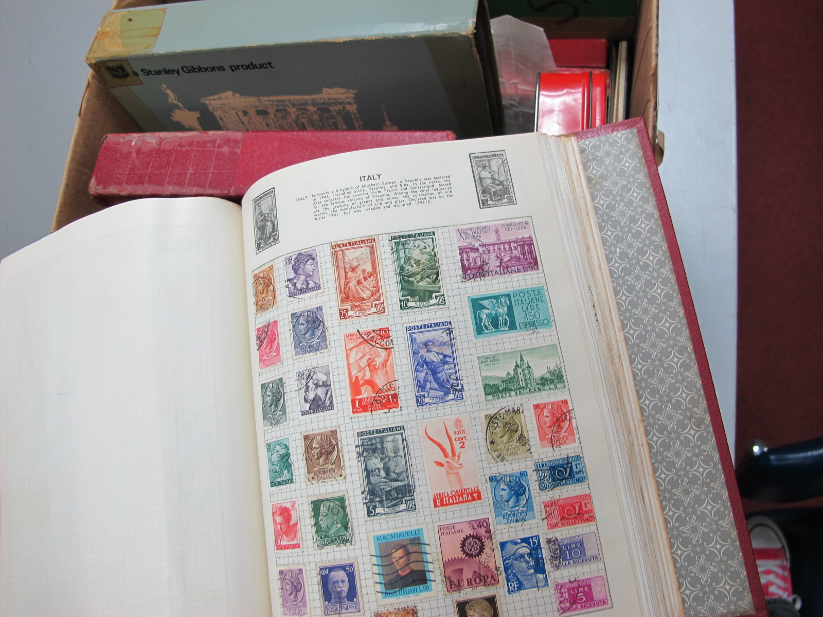 A Carton Containing Five Albums of G.B, Commonwealth and World Stamps, and small tins and boxes of