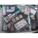 An Accumulation of World Stamps, including some Commonwealth mint and used on stock cards. A wide