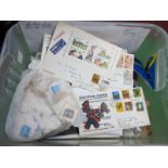 An Accumulation of World Stamps, mainly used and mint on album leaves and in packets, plus a small