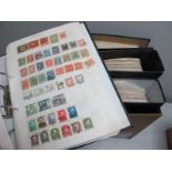 Four Ring Binders Housing a Predominately Used GB and World Collection of Stamps, Countries A-T many