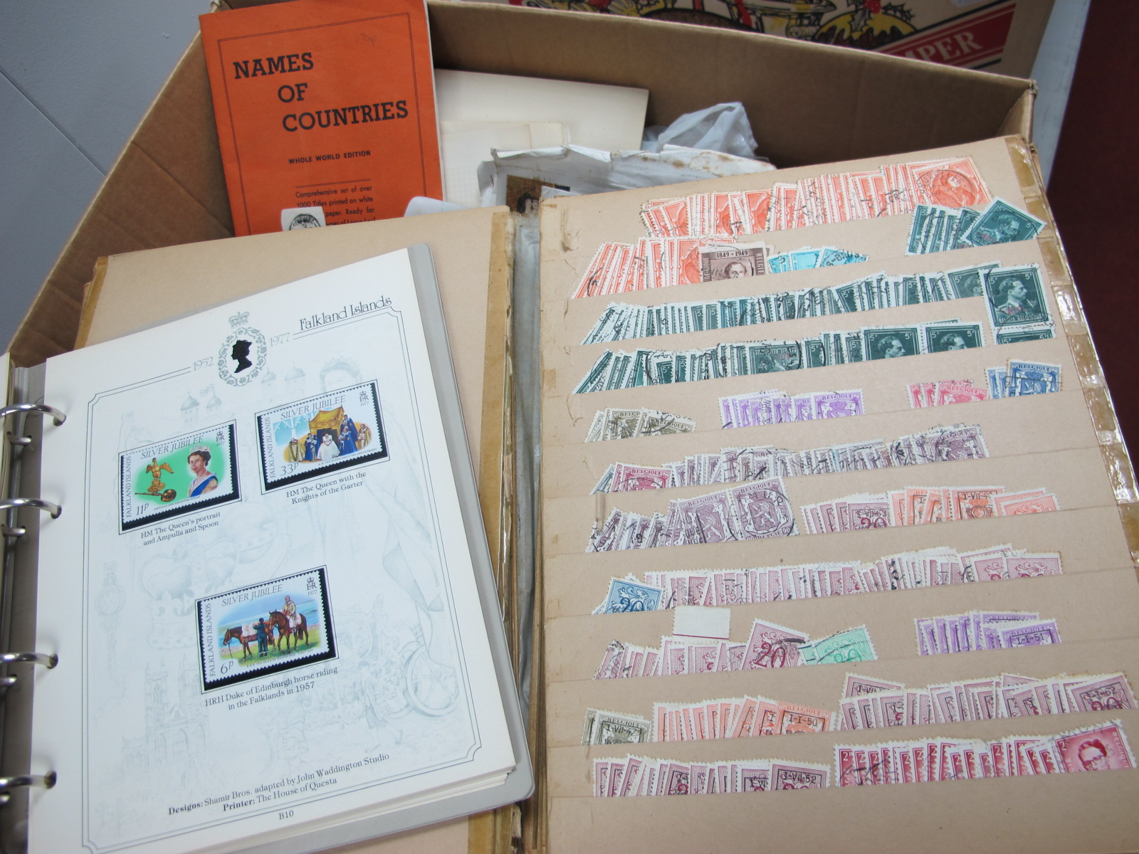 A Large Box of GB and World Stamps, on leaves, in stockbooks and albums, in tins and loose, mainly