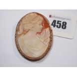 A Large Modern Oval Shell Carved Cameo Pendant/Brooch, depicting female profile, oval collet set