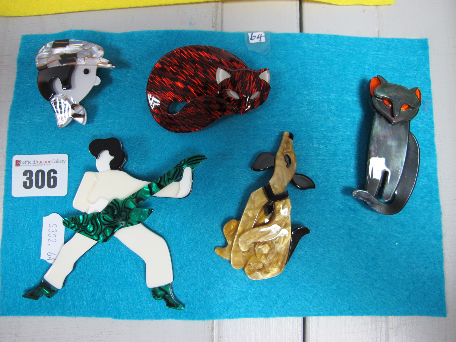 Five Modern Brooches.