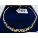 A Modern Flat Link Fancy Necklet, of openwork design, with inset highlights, stamped "750".