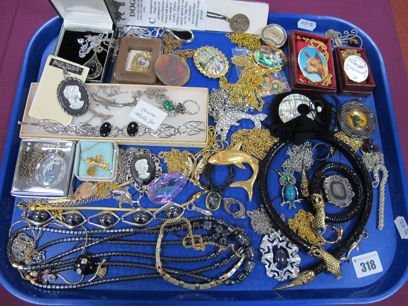 A Mixed Lot of Assorted Costume Pendants on Chains, including an ornate dolphin pendant on chain,