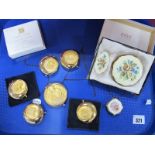 Modern Estee Lauder Star Sign Compacts, together with "December Angel" compact, Kigue compact and
