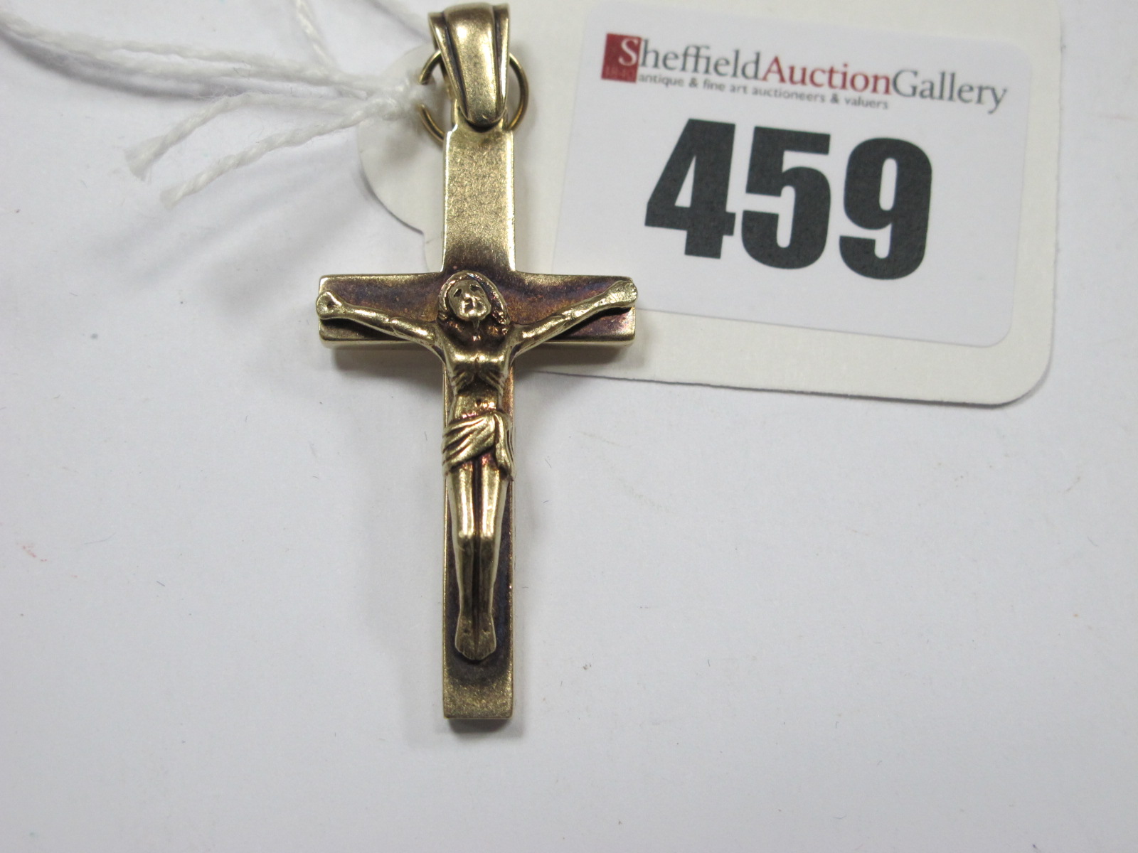 A 9ct Gold Crucifix Pendant.