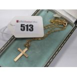 A Cross Pendant, stamped "9ct", on a 9ct gold fancy link chain, (total weight 2grams).