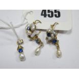 A Pair of Antique Style Fresh Water Pearl Earrings, with reverse hinged hooks, with claw set