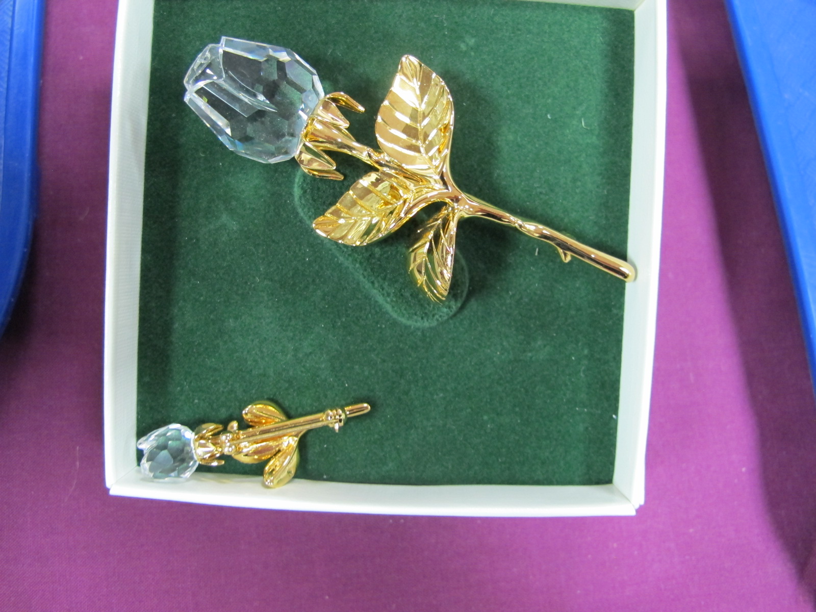 Swarovski Crystal Tulip Brooch, on gilt stem; another similar smaller (one boxed). (2)