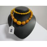 An Amber Coloured Bead Necklace, of graduated design.