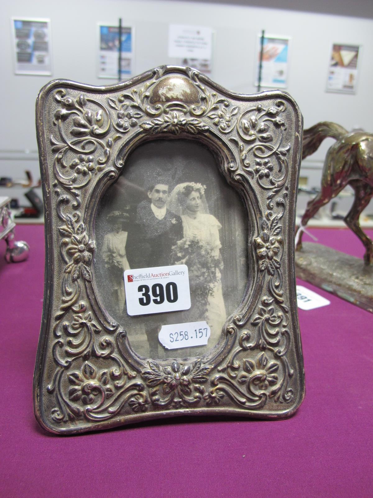 A Decorative Hallmarked silver Mounted Photograph Frame, JG, Birmingham 1900, on easel back, overall