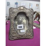 A Decorative Hallmarked silver Mounted Photograph Frame, JG, Birmingham 1900, on easel back, overall