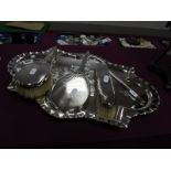 A Hallmarked Silver Backed Three Piece Dressing Table Set, (marks rubbed) engine turned and