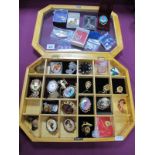A Mixed Lot of Assorted Costume Brooches, including, cameo style, etc; together with display case.