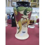 A Moorcroft Pottery Vase, painted in the 'Anna Lily' design by Nicola Slaney, shape 95/10, impressed