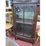 An Early XX Century Mahogany Display Cabinet, with chevron upper panels to glazed door, 65.5cm