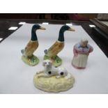 Royal Worcester Candle Snuffer as a Housewife, her right hand on pocket, left on waist, 6.5cm