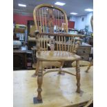 A XIX Century Ash and Elm Windsor Armchair, with spindle back, pierced central splat, dish seat,