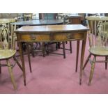 Mahogany Bow Fronted Side Table, with a crossbanded top over two small drawers, on sabre legs,