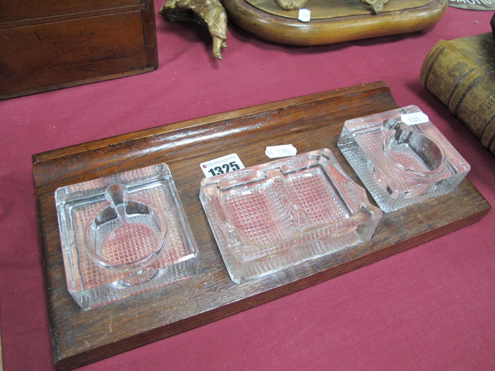 A Circa 1930's Oak Desk Set, featuring two glass inkwells, central double pipe rest and inset pen