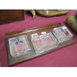 A Circa 1930's Oak Desk Set, featuring two glass inkwells, central double pipe rest and inset pen