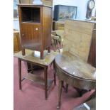 An Oak Fold Over Tea Table, of demi lune form with lift-up top, 76.5cm diameter, on tapering legs