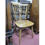 A Set of Six Modern Kitchen Chairs, with carved and pierced splat backs and turned supports. (6)