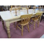 A Pine Farmhouse Kitchen Table, with rectangular top on turned legs, 213 x 85.5cm, a set of four