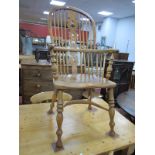 A XIX Century Ash and Elm Windsor Armchair, with spindle back, pierced central splat, dish seat,