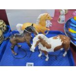 Beswick Pinto Pony, in brown and white, 16.5cm high; matt light brown Prancing Horse, with white