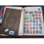 Album of World Stamps, penny reds noted, others, in a cigar box