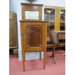 An Edwardian Inlaid Mahogany Bedside Cupboard, with mirror back on tapering legs, 110cm high.