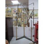 An Early XX Century Shop Display Stand for Three Boxed Shirts, adjustable heights.
