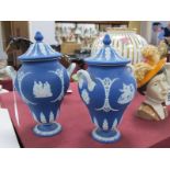 Wedgwood Blue Jasper Ware Pair of Urns, featuring classical scenes, twin white handles, complete