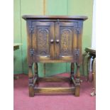 Bevan Funnell Reproduction Oak Cabinet, with arched tree of life carving to twin doors, on turned
