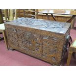 Camphor Wood Blanket Chest, with inner tray, the exterior heavily carved with figures, birds and