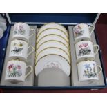 Royal Worcester Coffee Cans and Saucers, decorated with flowers, in fitted case.