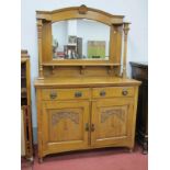 A Late XIX Century Oak Mirror Backed Sideboard, with arched bevelled pane, shell cresting,