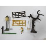 A Reproduction Britains Boy on Swing with Gate, plus an original Dovecote.