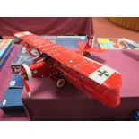 A Meccano Based Model of The German 1st War 'Red Barons' Tri-Plane, with twin guns, pilot,