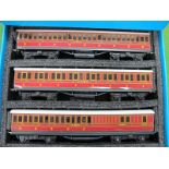 An Ace Trains "O Gauge Coach Set C1, comprising three LMS suburban coaches, very good, boxed.