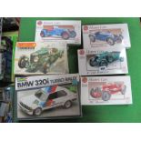 Six Unmade Plastic Kits, by Airfix, Matchbox and Revell. All classic cars including Revell BMW