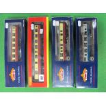 Three Bachmann "OO" Eight Wheel Coaches, a MK1 Restaurant in blue and grey and two blood and