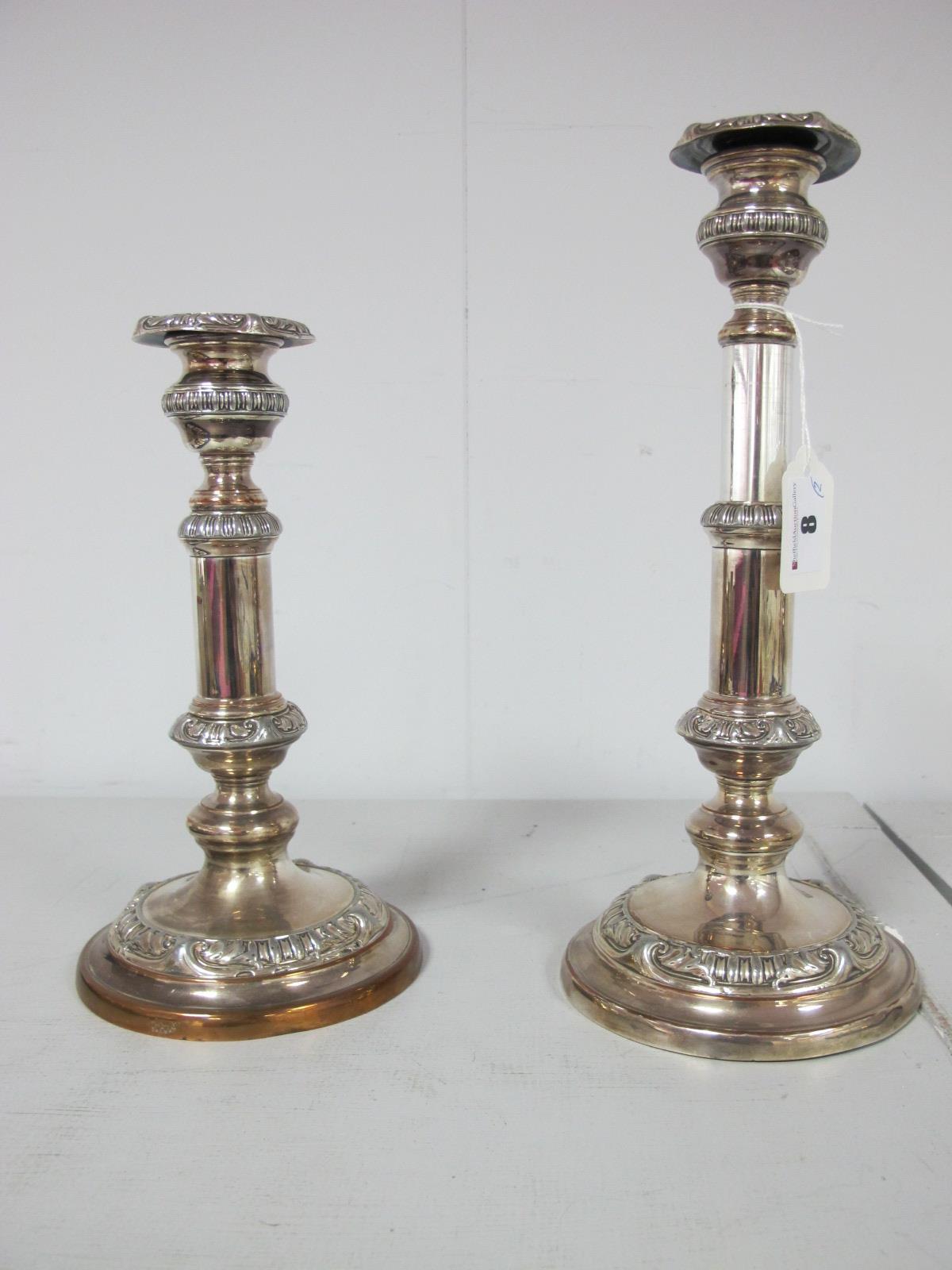 A Pair of XIX Century Plated on Copper Telescopic Candlesticks, of circular form with gadrooned