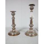 A Pair of XIX Century Plated on Copper Telescopic Candlesticks, of circular form with gadrooned