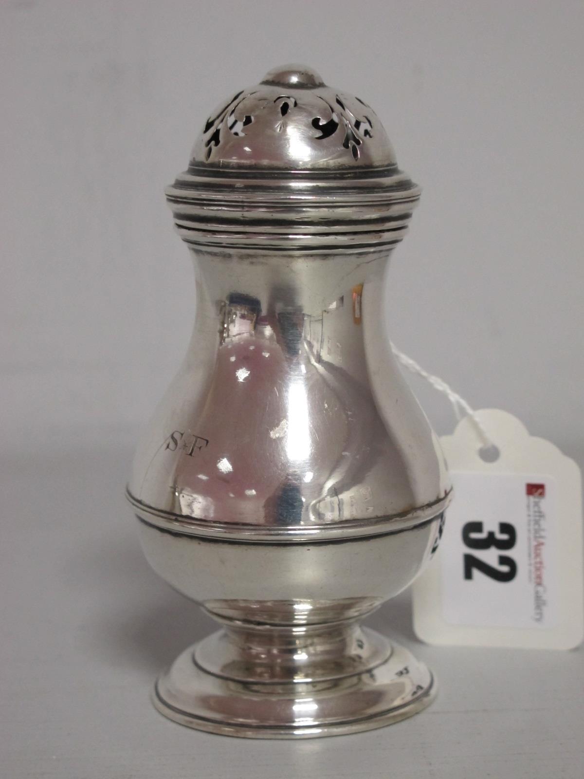 A George II Hallmarked Silver 'Bun' Caster, F.T, London 1725, of plain baluster form, initialled "