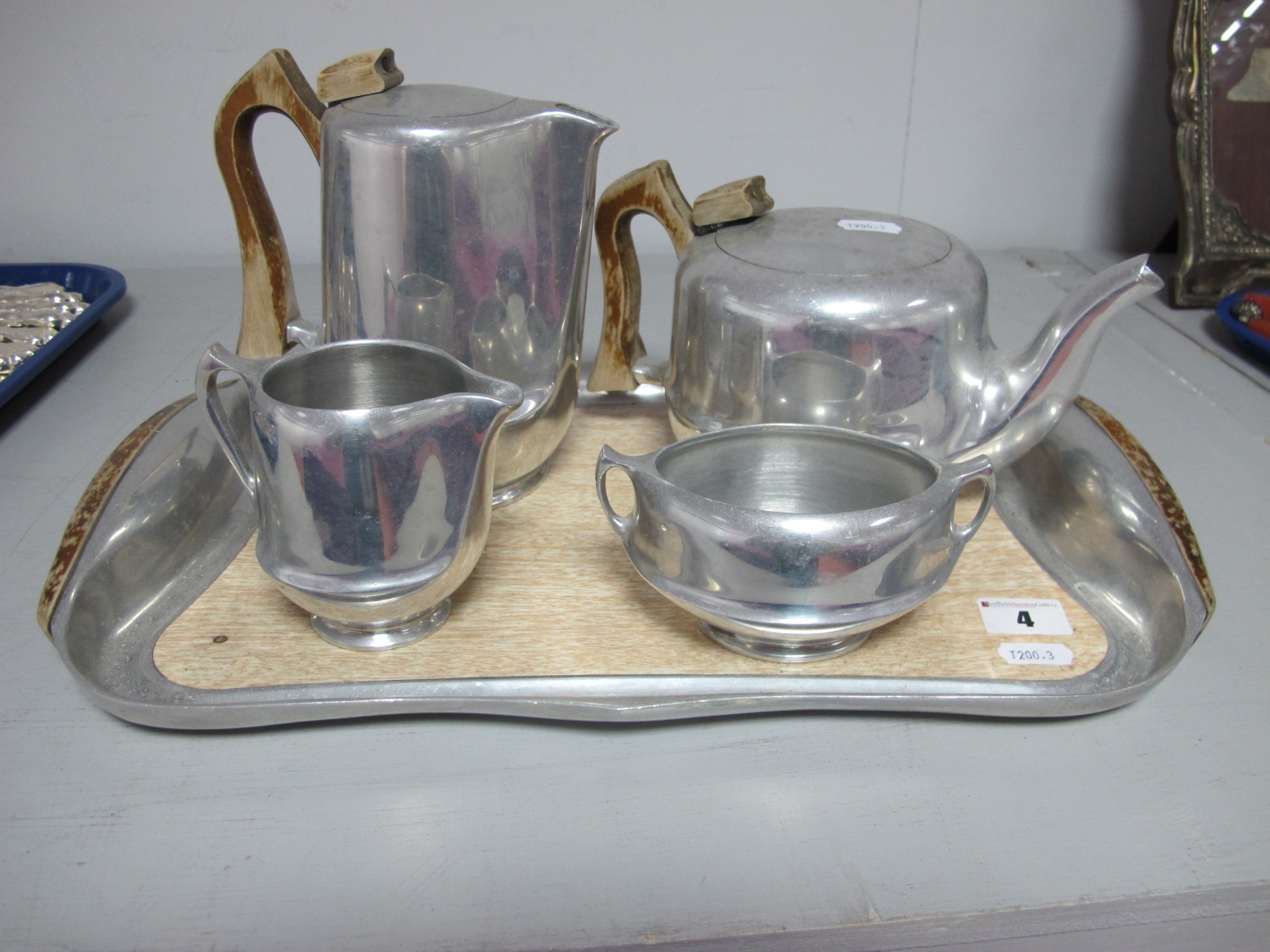 Picquot Ware Four Piece Tea Service; together with matching tray.